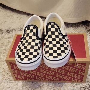 Vans Black and White Checkerboard Slip-Ons